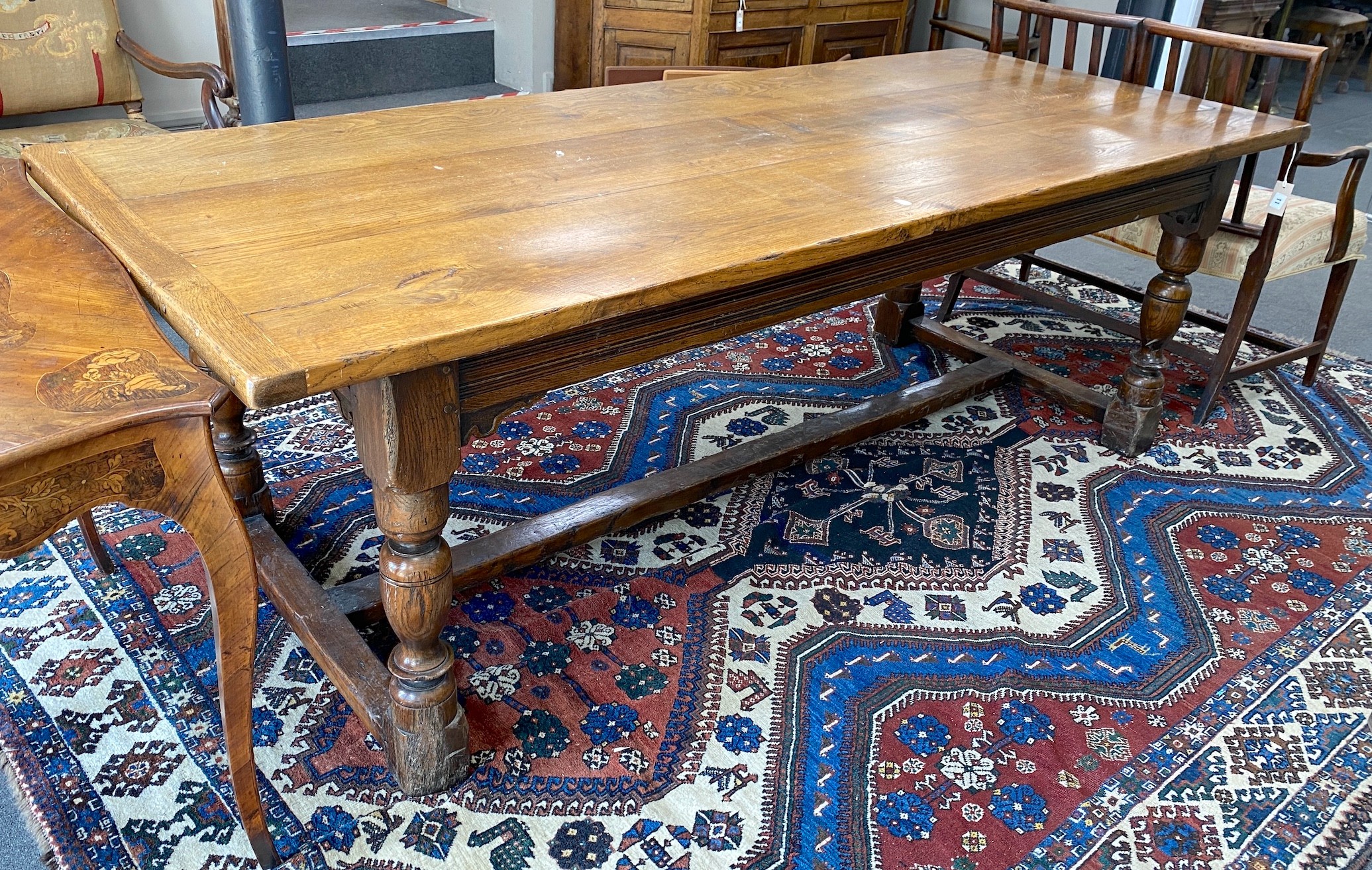 An 18th century style rectangular oak refectory dining table, length 227cm, depth 92cm, height 76cm